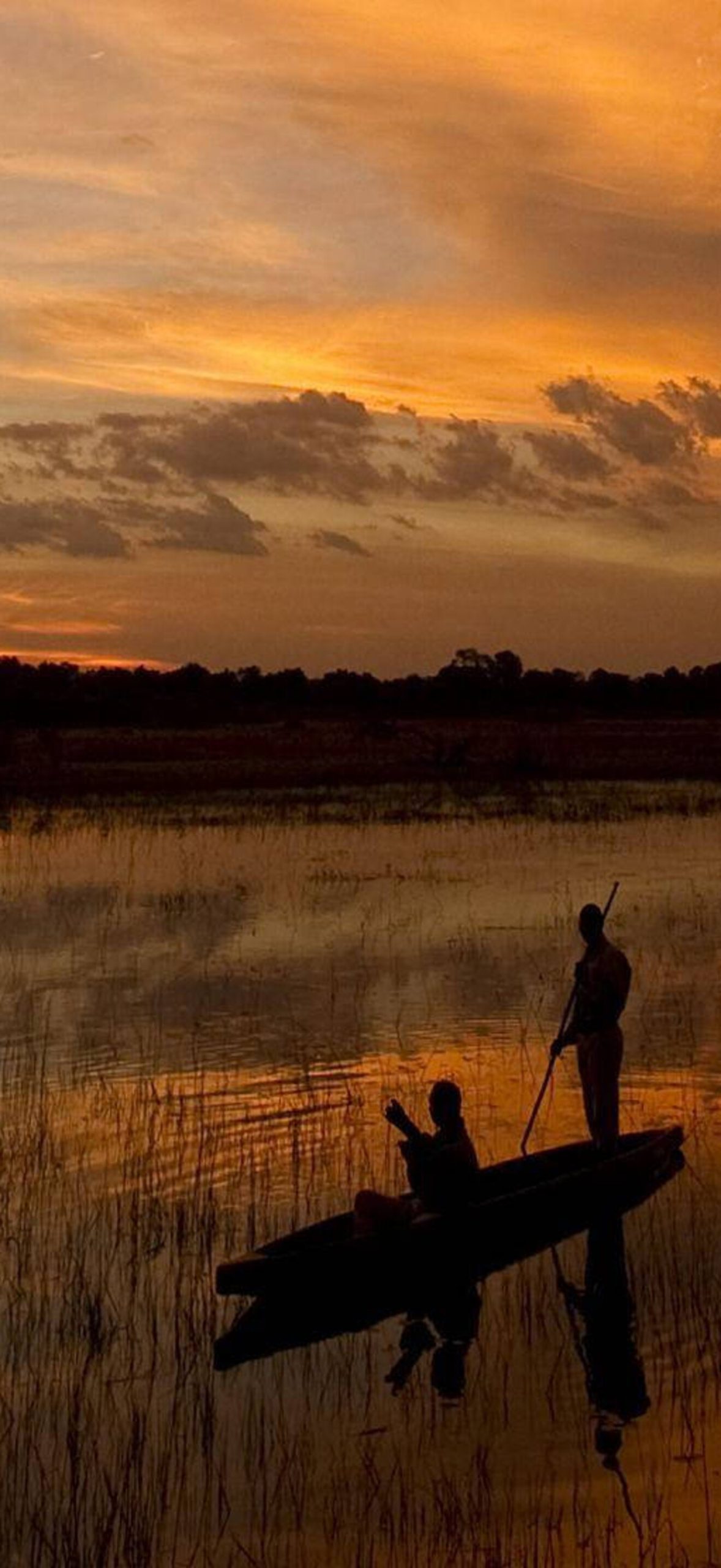 Serene Botswana Sunset Canoeing Ultra HD iPhone 17 Nature Wallpaper