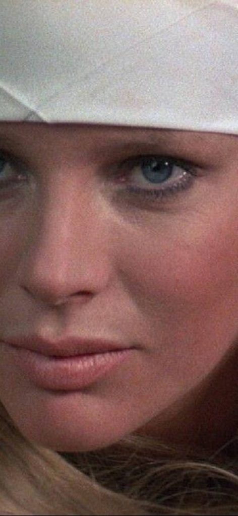 Kim Basinger as Domino Petachi Bond Girl iPhone 17 Wallpaper